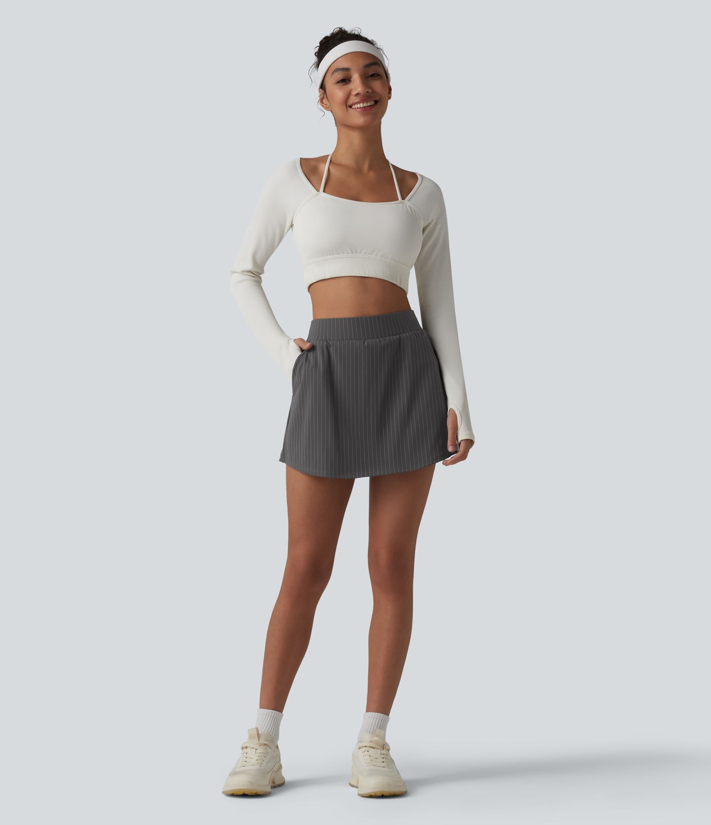 2-in-1 sports mini skirt with mid-rise waist and multiple pockets