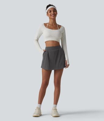 2-in-1 sports mini skirt with mid-rise waist and multiple pockets