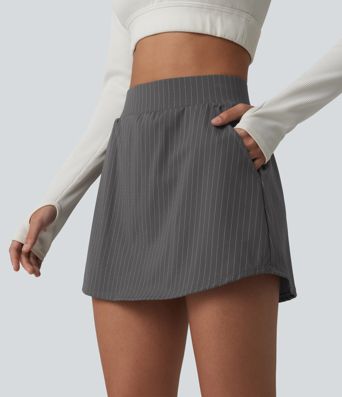 2-in-1 sports mini skirt with mid-rise waist and multiple pockets