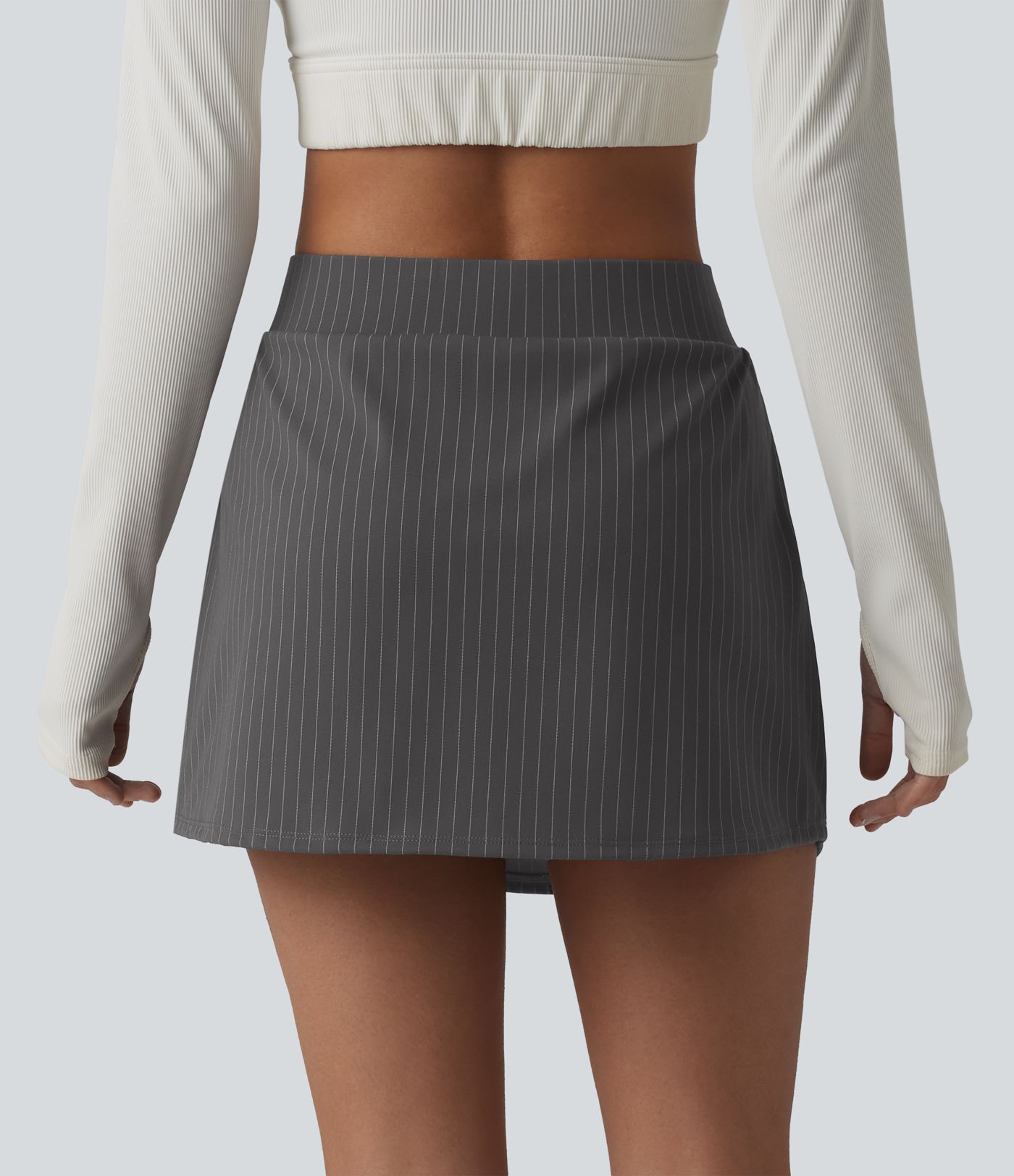 2-in-1 sports mini skirt with mid-rise waist and multiple pockets