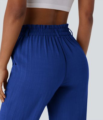 Pantalón capri lino tiro alto bolsillo lateral cremallera botón