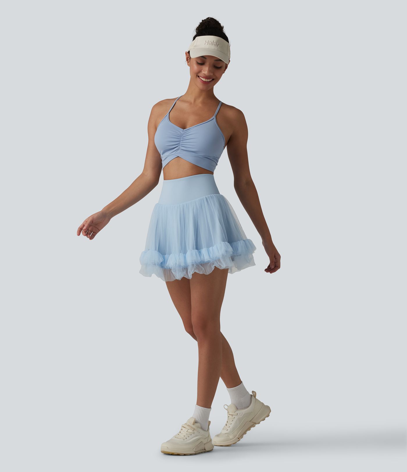 Hochtaillierter, figurformender 2-in-1-Minirock aus kontrastierendem Mesh mit Taschen