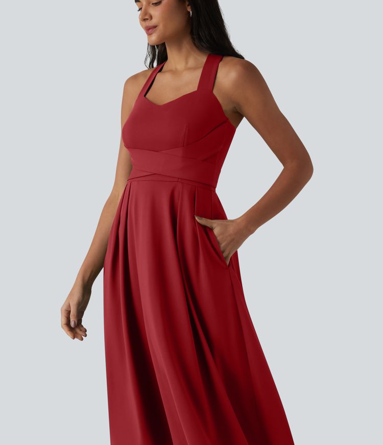 Robe midi fluide sans manches décolleté cœur avec bretelles croisées, nœud dans le dos et poches