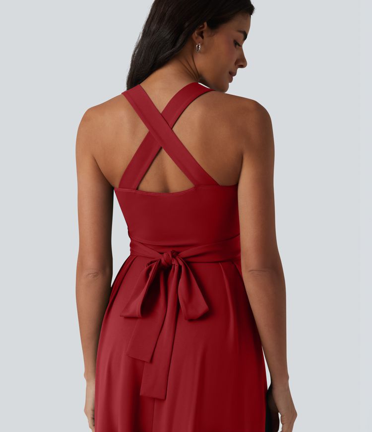 Robe midi fluide sans manches décolleté cœur avec bretelles croisées, nœud dans le dos et poches