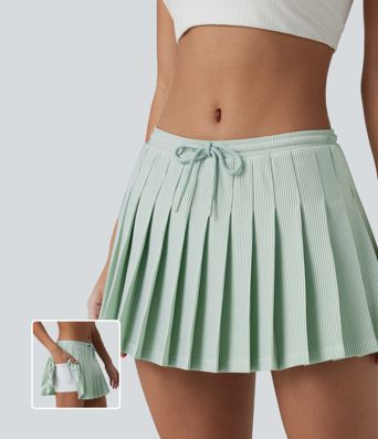Plissierter 2-in-1 Pickleball-Minirock mit niedrigem Bund, Seitentaschen, Kordelzug und Streifen