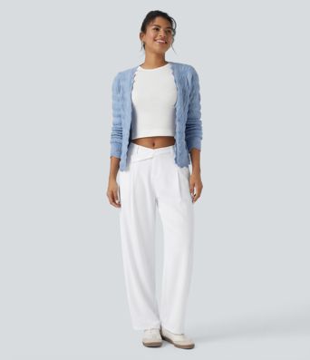 Asymmetrische, mittelhoch sitzende, lässig geschnittene, schmal zulaufende Hose mit Taschen