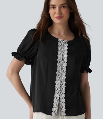 Lässige Bluse mit Rundhalsausschnitt, kurzen Puffärmeln und Kontrastspitze