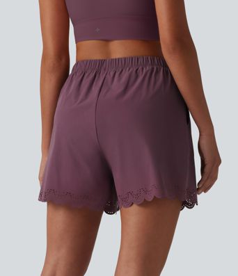 2-in-1 Bikinihose mit hohem Bund, Seitentaschen und Kordelzug - 7,6 cm