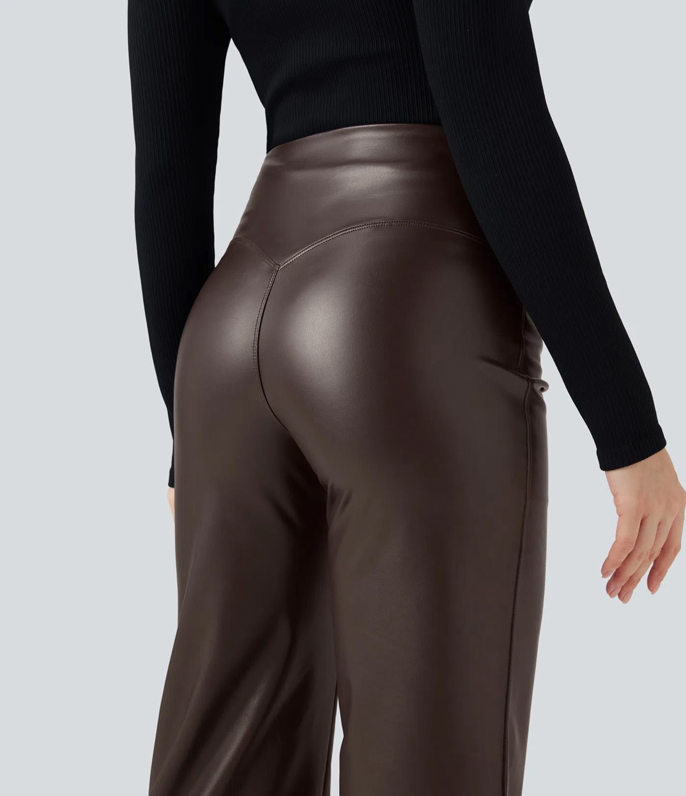 Casual fleece flared trousers made of stretchy faux leather with a high waist, side pockets and tummy control.