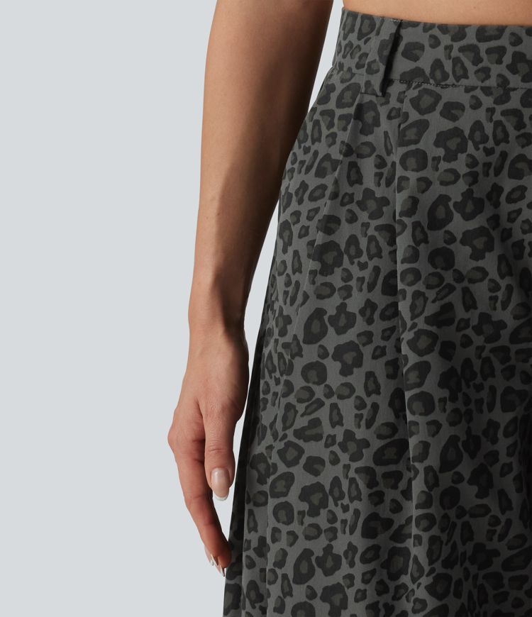 Spodnie casualowe z kieszeniami i średnim stanem, nadrukiem w panterkę