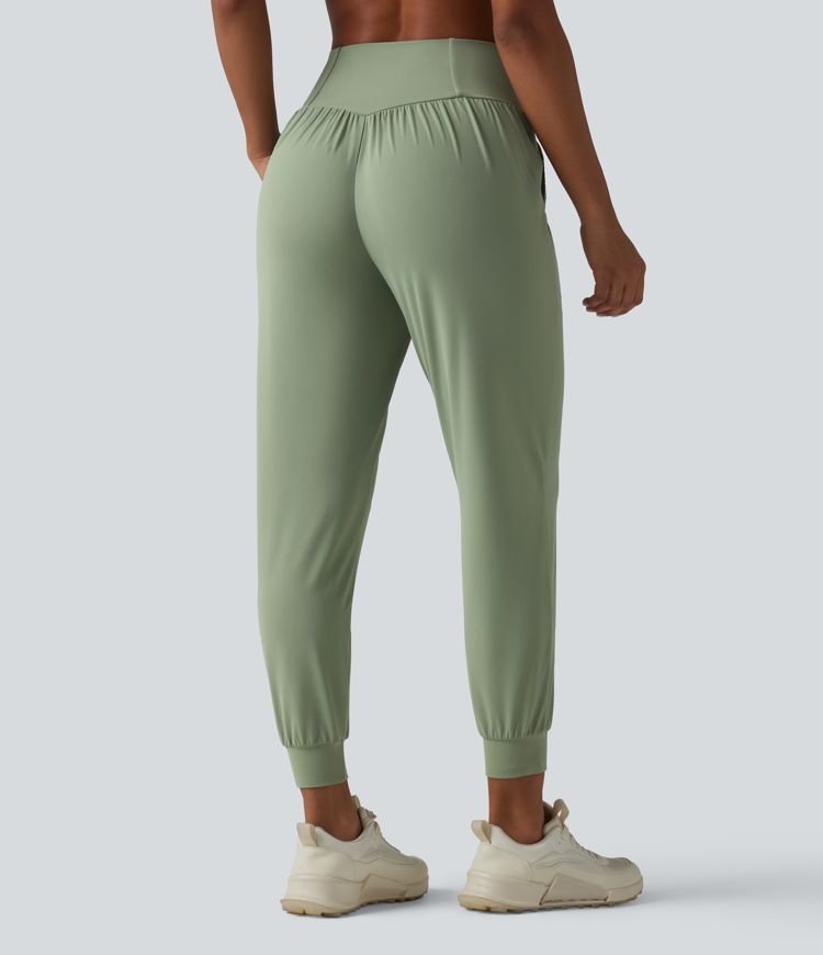 SoftlyZero™ - Schmal zulaufende Yoga-Joggers mit hohem Crossover-Bund und Seitentaschen - UPF50+