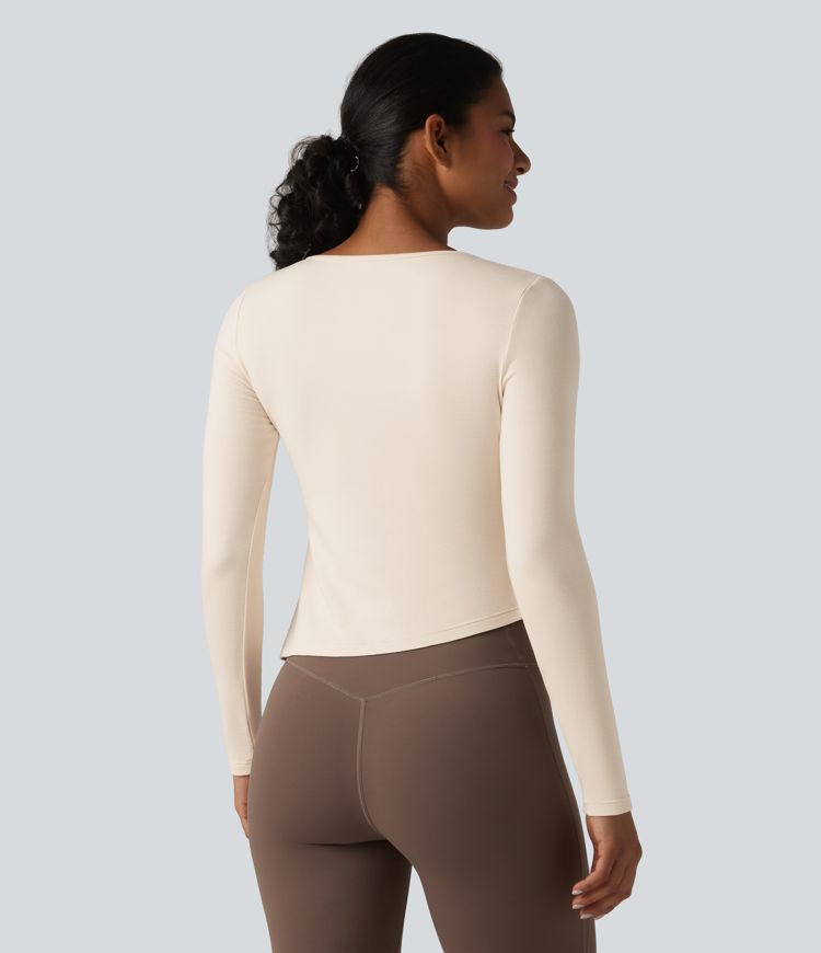 Halara HeatCore Round Neck Long Sleeve Asymmetric Hem Workout Warming Top