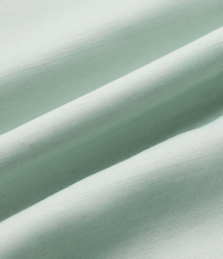 Aukšto liemens, šone surišamomis raišteliais ir laisvo audinio kelnės su kišenėmis