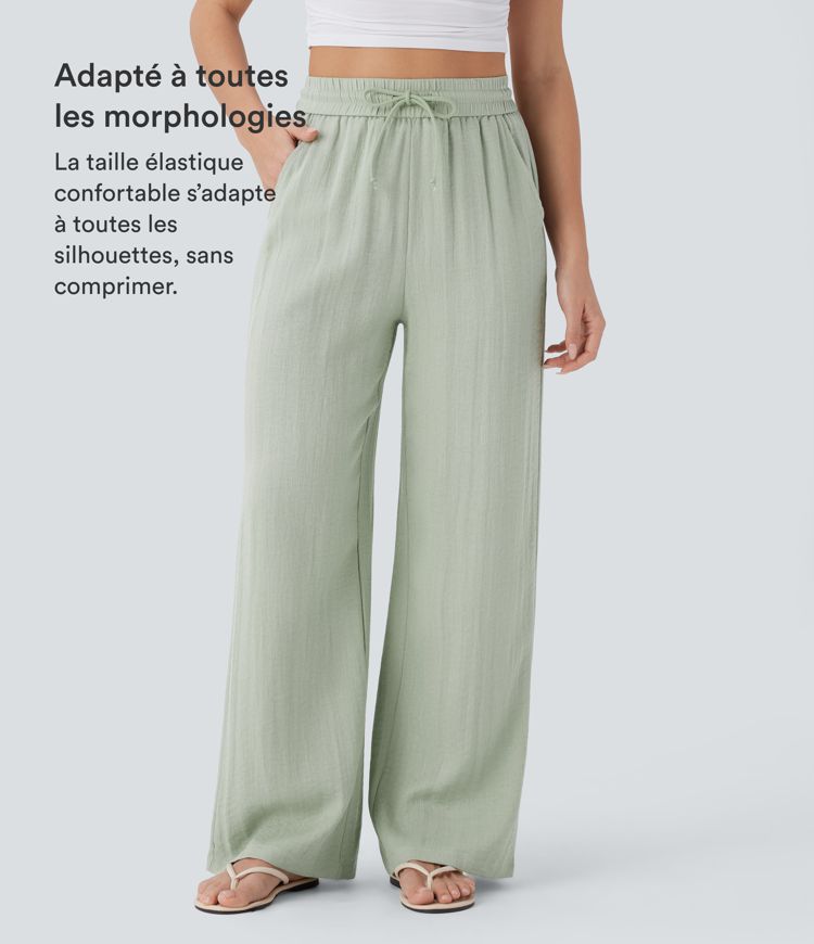 Pantalon large fluide taille haute avec cordon de serrage, poches latérales et aspect lin