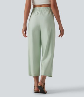 Pantalon casual court en coton et lin taille haute coupe ballon avec cordon de serrage et poches