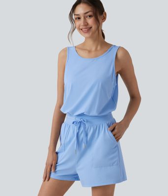 Yoga-Jumpsuit mit Rundhalsausschnitt, Seitentaschen, Kordelzug und Cut-Out-Design - UPF50+