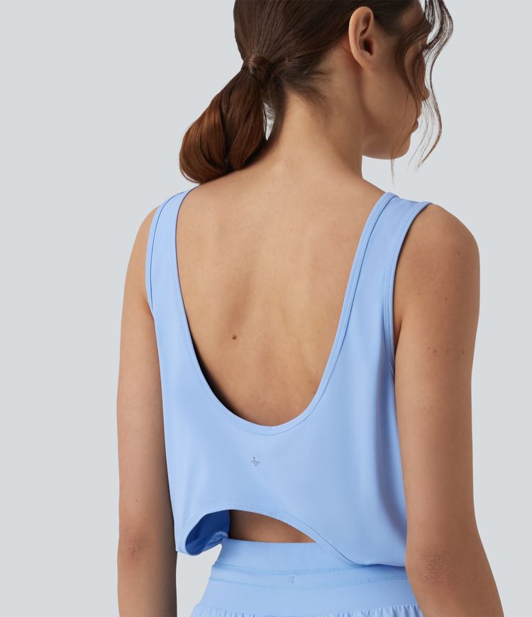 Yoga-Jumpsuit mit Rundhalsausschnitt, Seitentaschen, Kordelzug und Cut-Out-Design - UPF50+