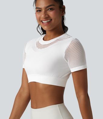 OneForm Seamless Flow - Top deportivo corto con cuello redondo, mangas cortas y diseño con aberturas.