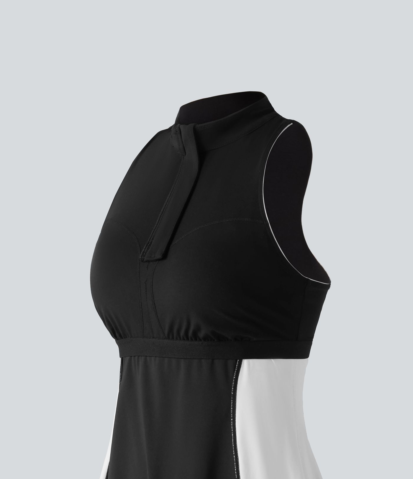 Halara UltraSculpt™ Mini-Golf-Active-Kleid mit angedeutetem Stehkragen (Mock Neck), eingearbeitetem BH, Racerback und Colorblock