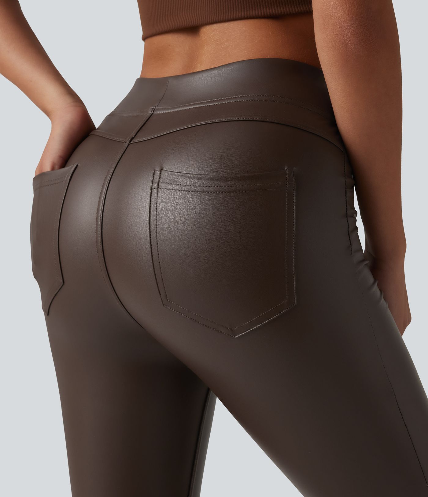 Pantalon skinny casual taille haute en simili cuir extensible avec poches Pantalon skinny casual taille haute en simili cuir extensible avec poches