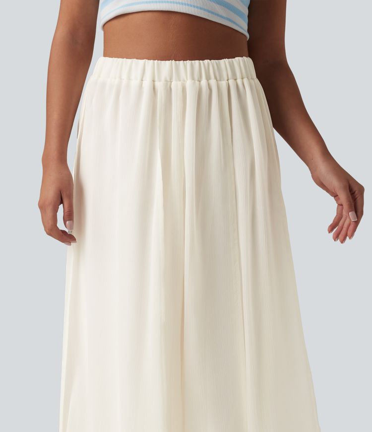 Fließender Midirock mit hohem Bund