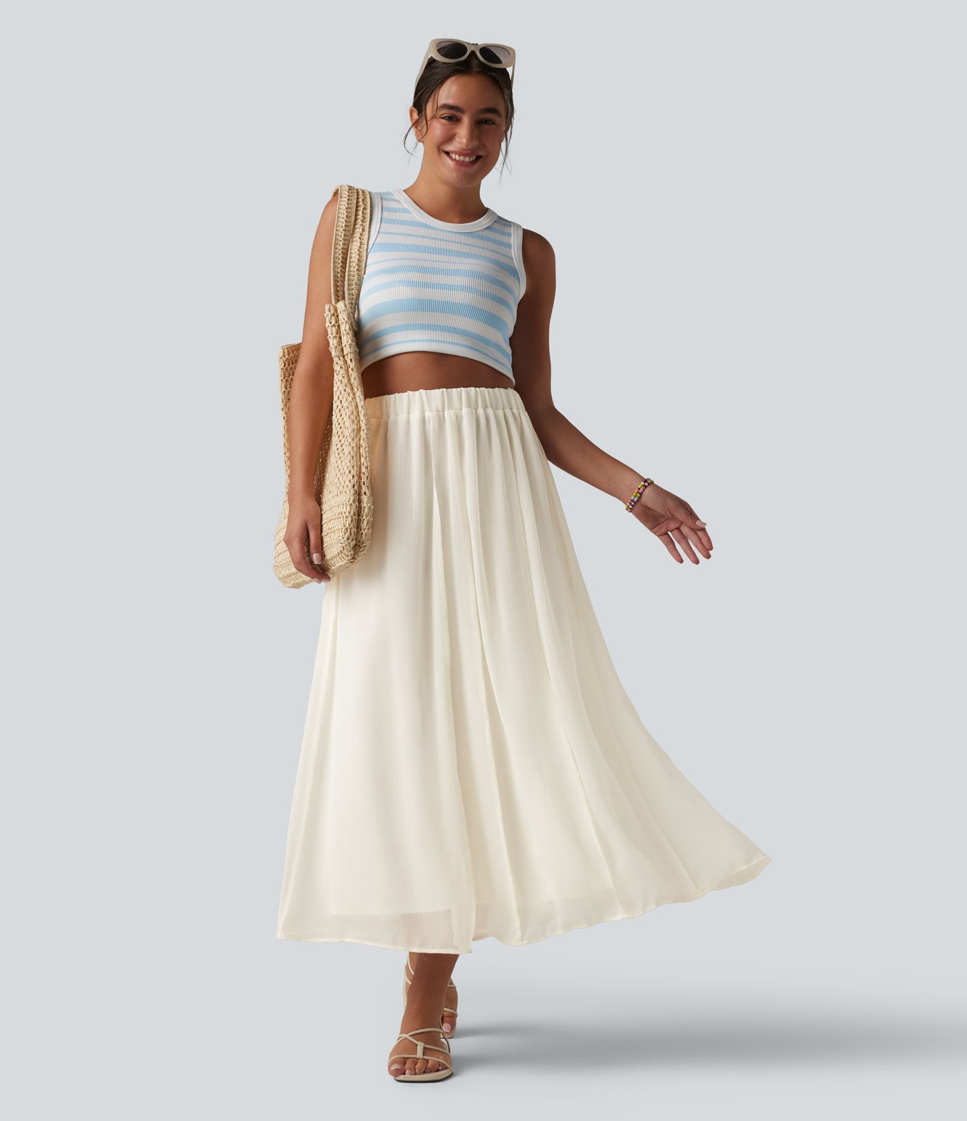 Fließender Midirock mit hohem Bund