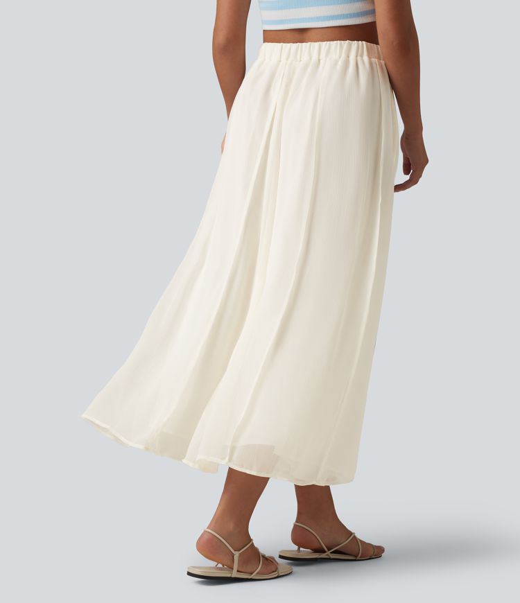 Fließender Midirock mit hohem Bund