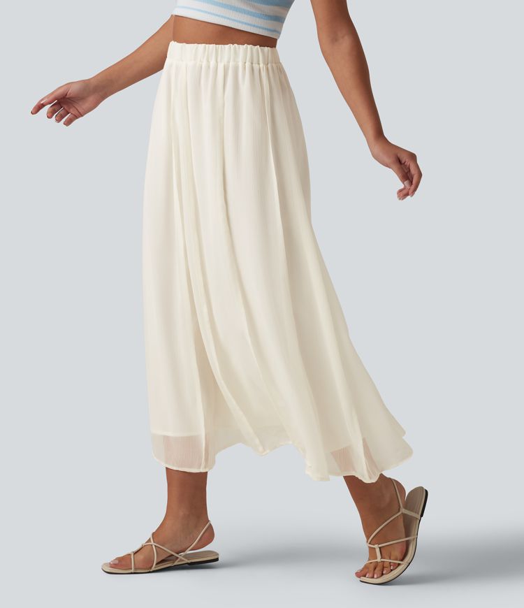 Fließender Midirock mit hohem Bund