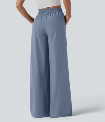 Lässige Hose mit hohem Bund, mehreren Taschen und weitem Bein Lässige Hose mit hohem Bund, mehreren Taschen und weitem Bein