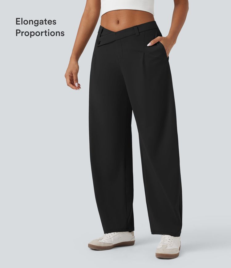 Asymmetriske, afslappede taperede bukser med mellemhøj talje og lommer