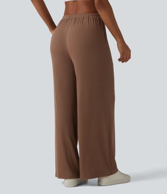 Pantaloni casual larghi in maglia a coste ad alta elasticità, vita media, con coulisse e tasche.