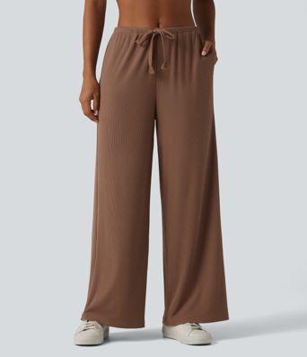 Pantaloni casual larghi in maglia a coste ad alta elasticità, vita media, con coulisse e tasche.