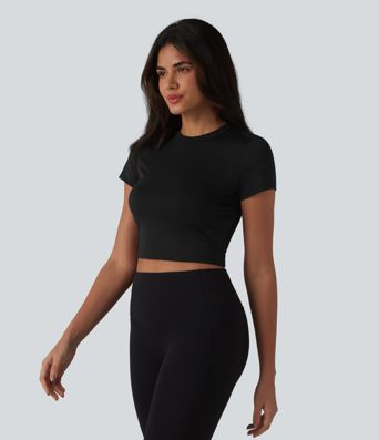 Haut de sport SoftlyZero™ Airy à col rond, manches courtes, dos échancré, maille respirante au toucher frais, protection UPF50+
