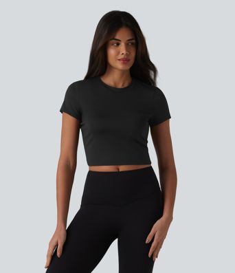 Haut de sport SoftlyZero™ Airy à col rond, manches courtes, dos échancré, maille respirante au toucher frais, protection UPF50+