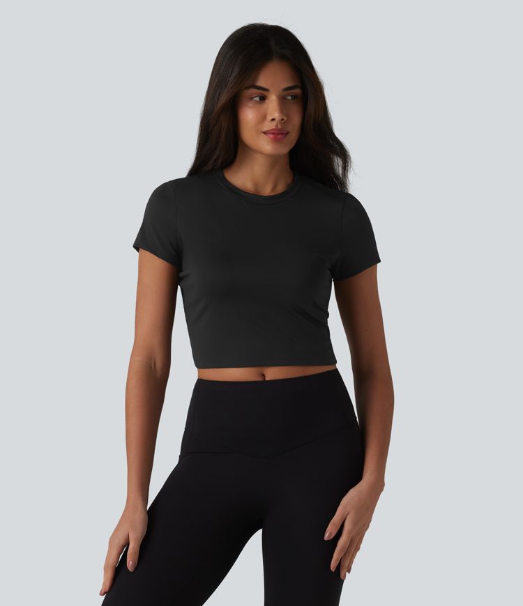 Haut de sport SoftlyZero™ Airy à col rond, manches courtes, dos échancré, maille respirante au toucher frais, protection UPF50+