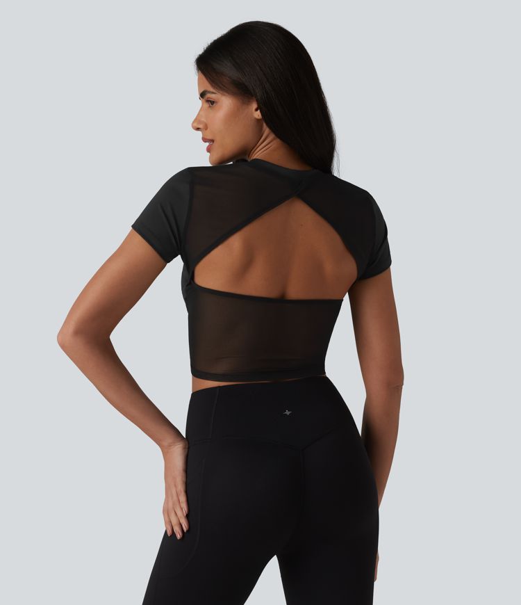 Haut de sport SoftlyZero™ Airy à col rond, manches courtes, dos échancré, maille respirante au toucher frais, protection UPF50+