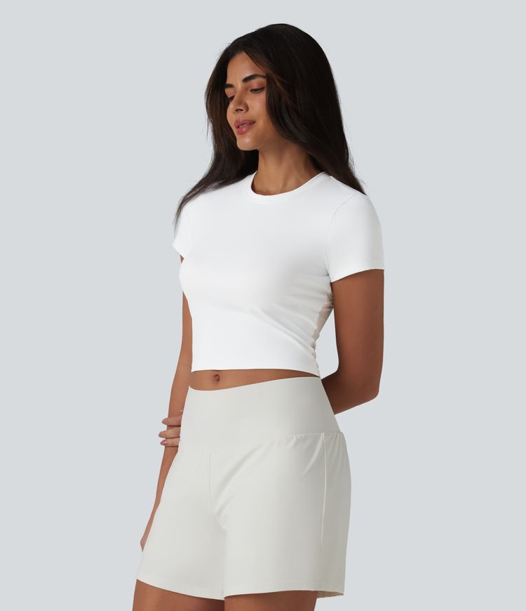 Haut de sport SoftlyZero™ Airy à col rond, manches courtes, dos échancré, maille respirante au toucher frais, protection UPF50+