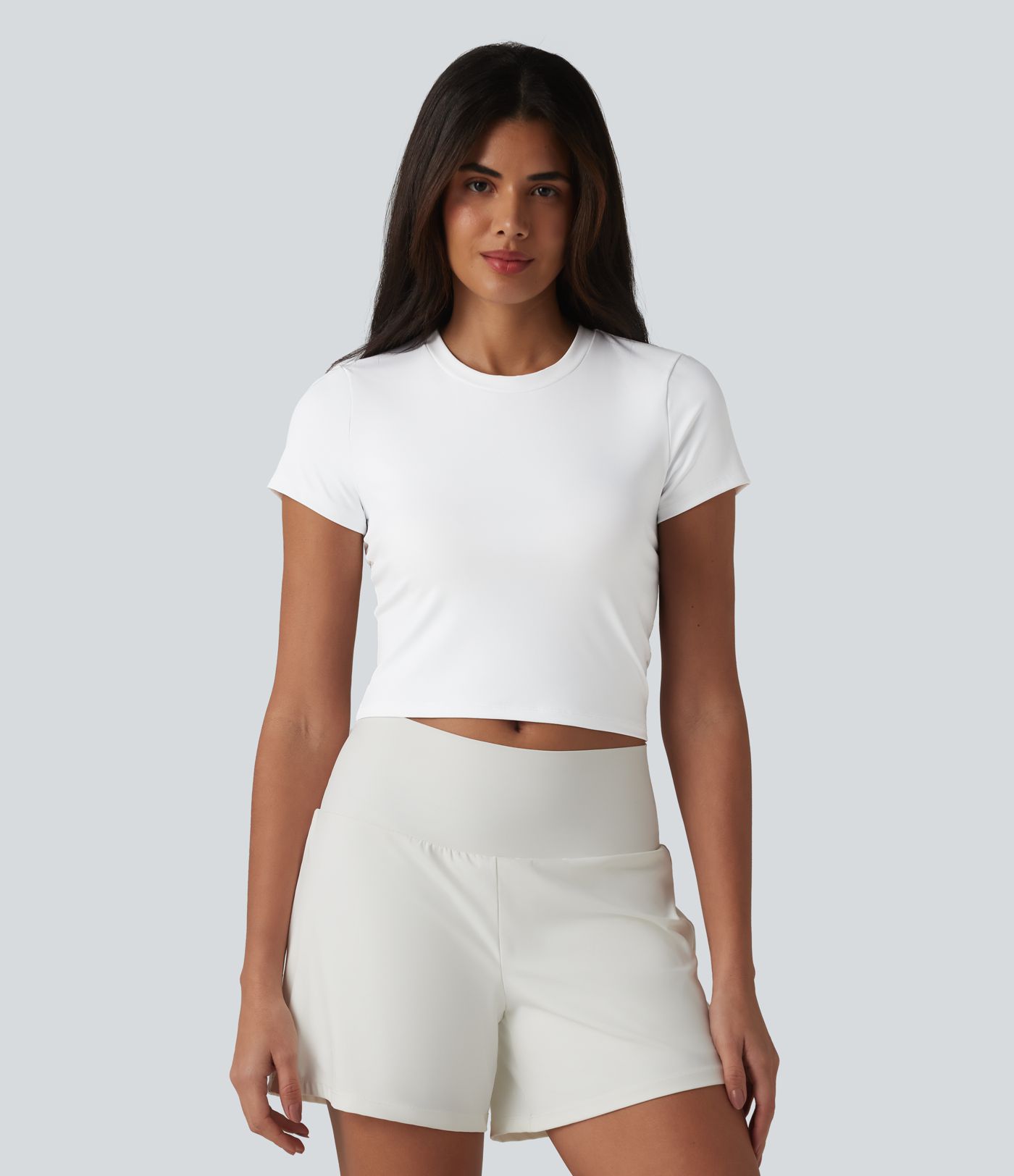 Haut de sport SoftlyZero™ Airy à col rond, manches courtes, dos échancré, maille respirante au toucher frais, protection UPF50+