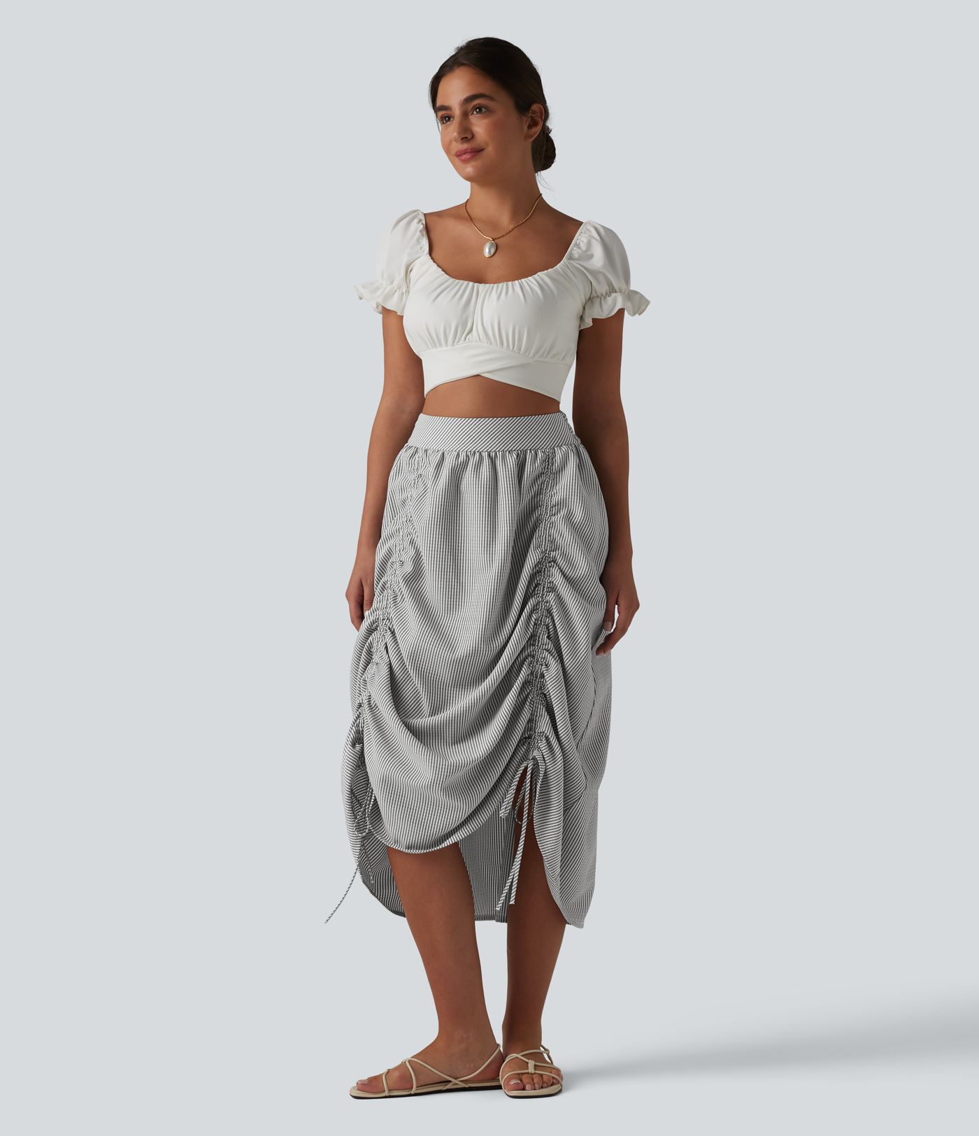 Jupe midi trapèze décontractée à taille haute, poches latérales, cordon de serrage et rayures