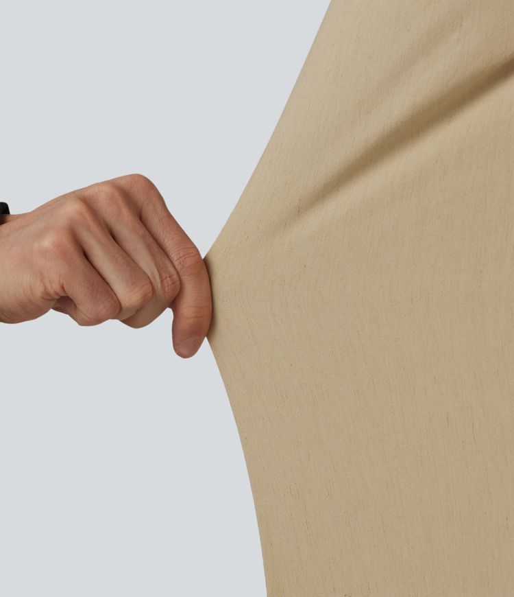 Casual trousers made of stretchy linen with a high waist, side pockets and a straight leg