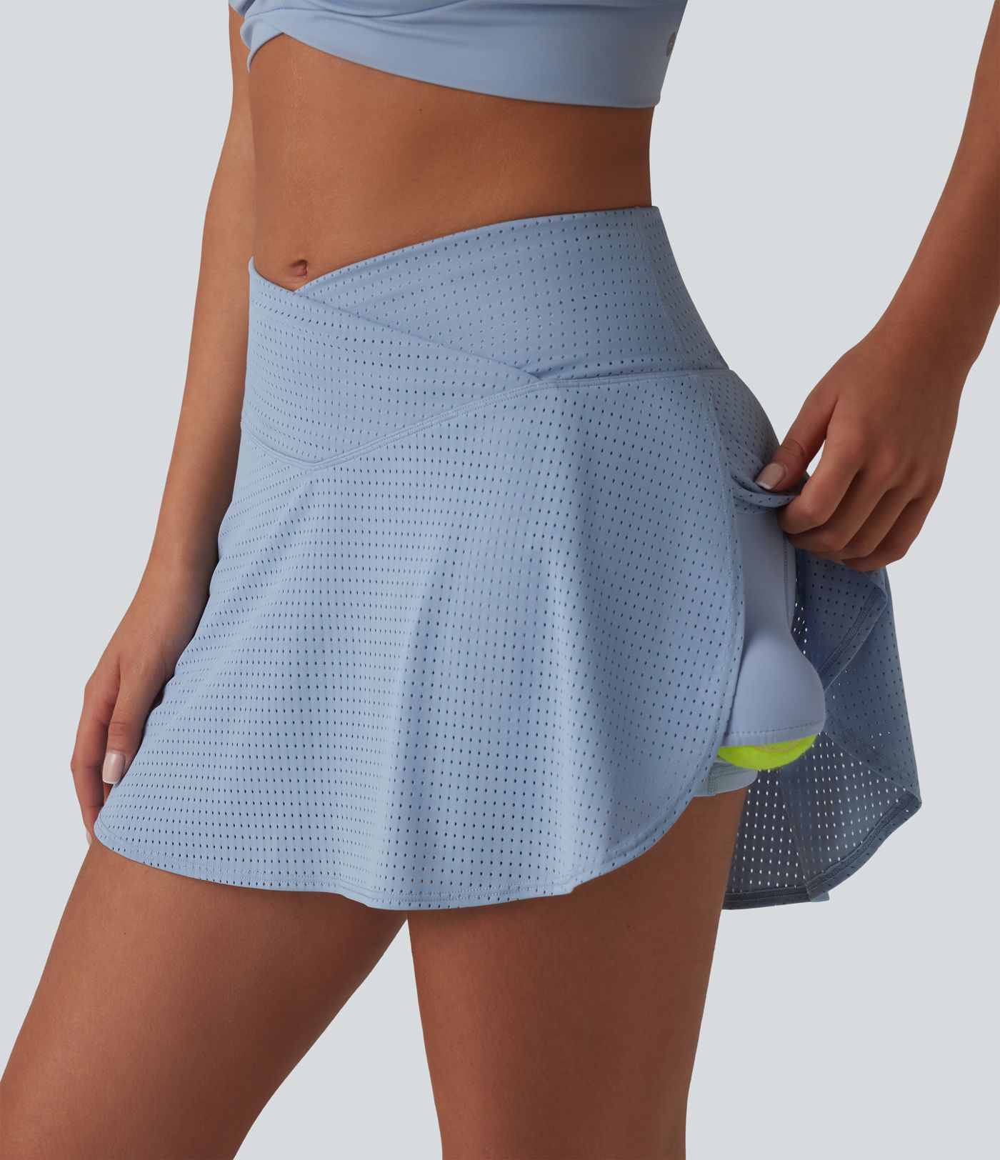 Crossover High Waisted 2-in-1 A-line Mini Eyelet Tennis Skirt with Pockets