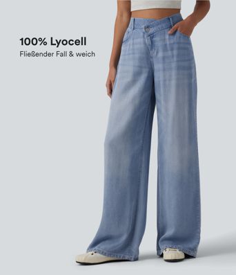 Lässige Jeans aus Lyocell mit mittelhohem Crossover-Bund, mehreren Taschen und weitem Bein