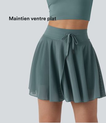 Jupe mini fluide évasée 2-en-1 taille haute à cordon, empiècements en mesh contrastant, avec poche, version plus longue