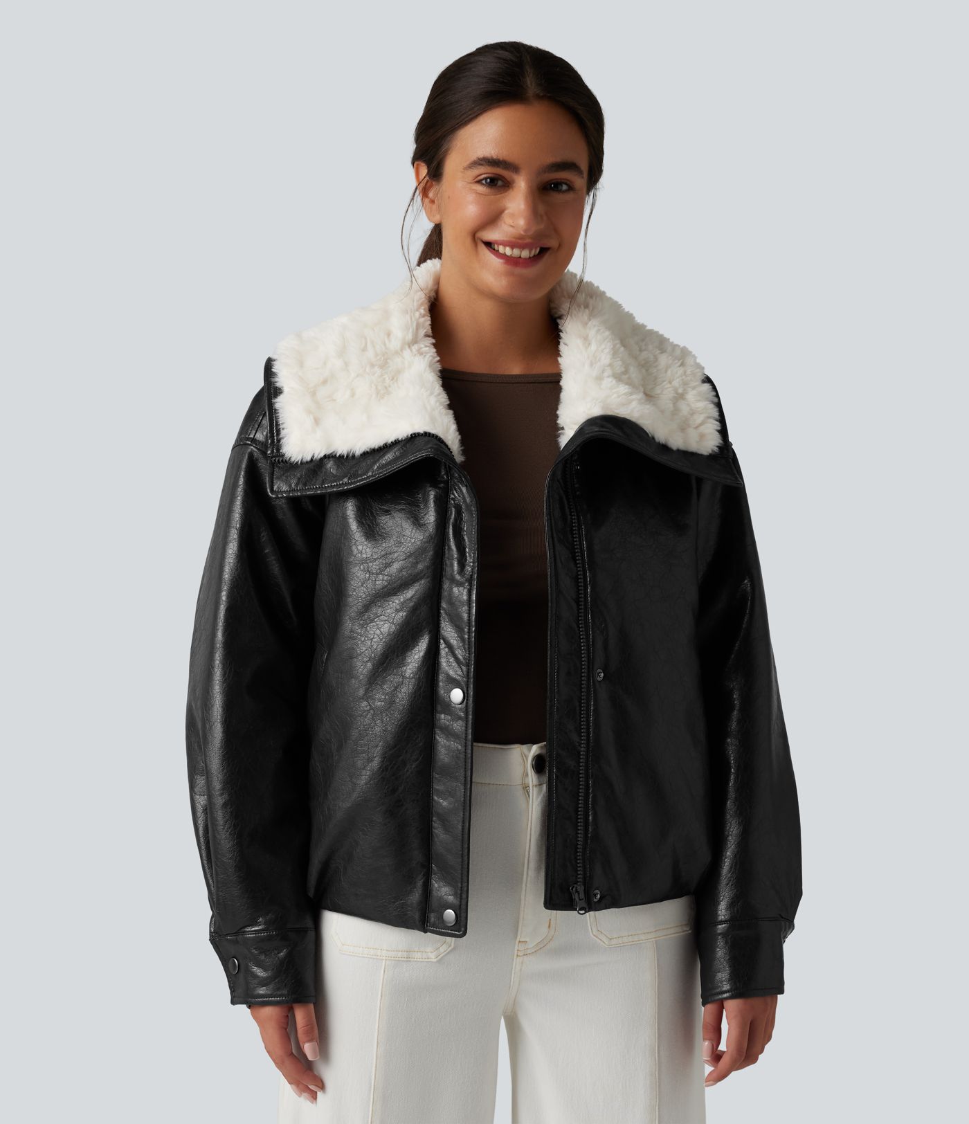 Casual faux leather jacket with faux fur collar and zip fastening with pockets