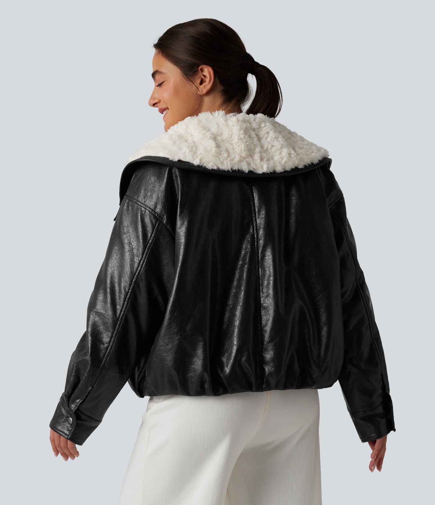 Casual faux leather jacket with faux fur collar and zip fastening with pockets