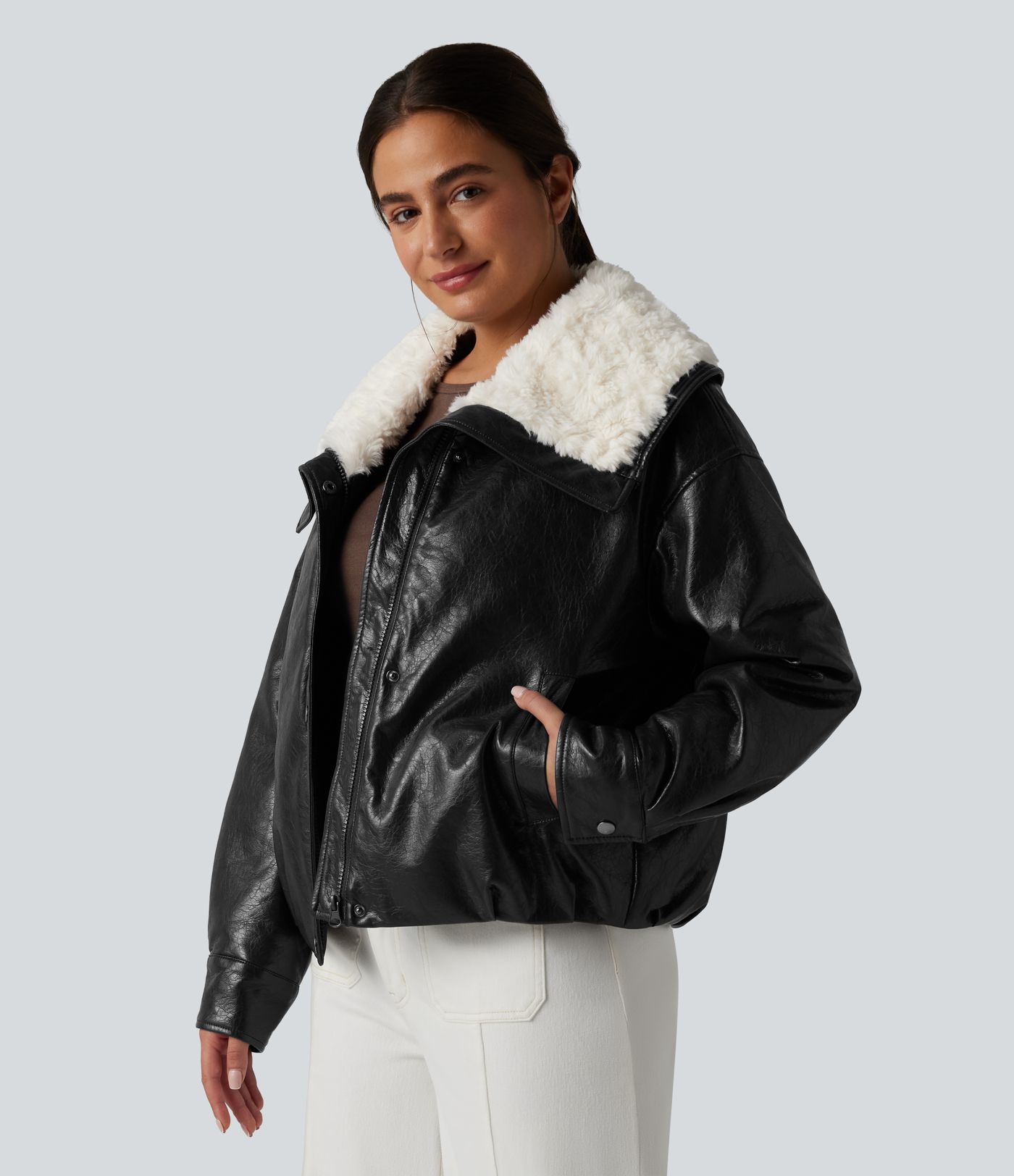 Casual faux leather jacket with faux fur collar and zip fastening with pockets