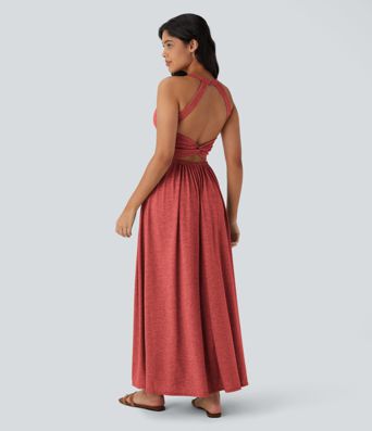 Robe longue fluide fendue avec poches latérales, dos nu et effet torsadé
