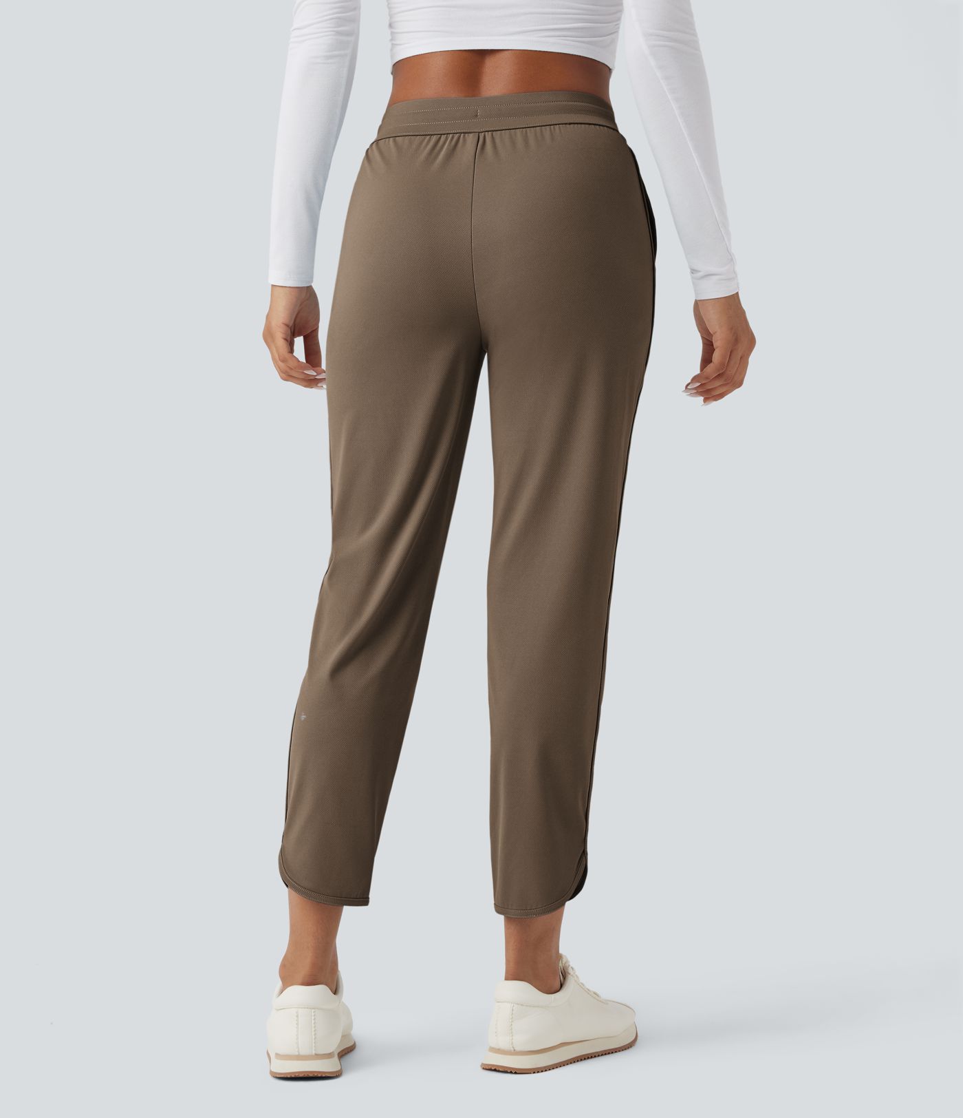 Golf-Hose mit mittelhohem Bund, Seitentaschen und schmal zulaufendem Bein - schnelltrocknend, UPF40+