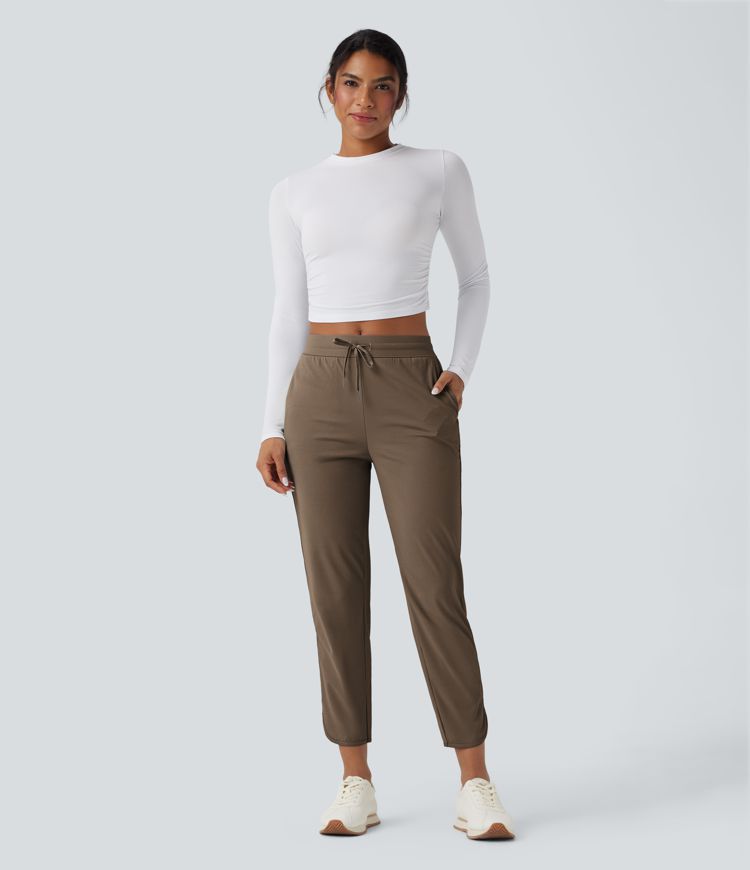 Golf-Hose mit mittelhohem Bund, Seitentaschen und schmal zulaufendem Bein - schnelltrocknend, UPF40+