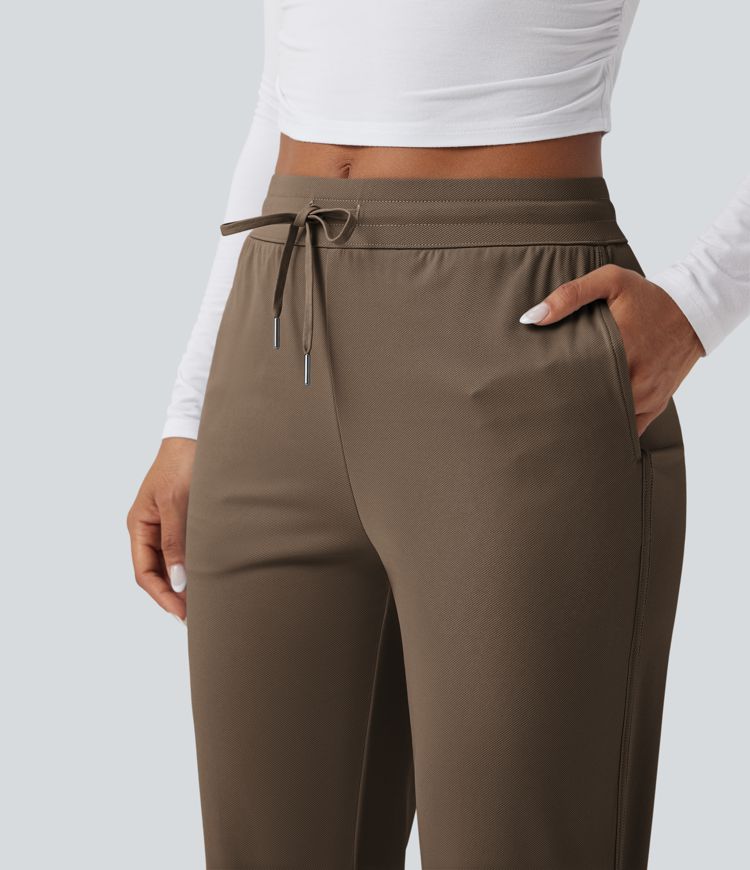 Golf-Hose mit mittelhohem Bund, Seitentaschen und schmal zulaufendem Bein - schnelltrocknend, UPF40+